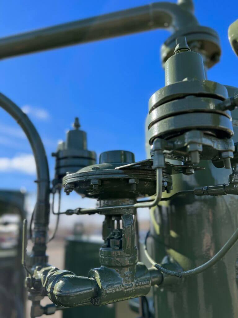 Gas engine wellhead compressor